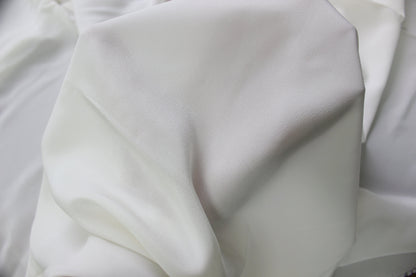MingSilk 18 momme Crepe de Chine draped over a form to show its coverage, medium body and smooth fall.