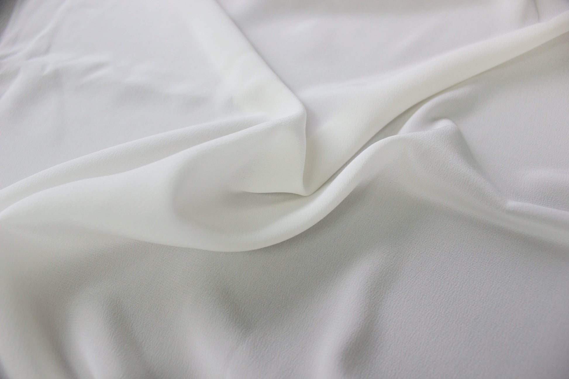 MingSilk 18 momme Crepe de Chine showing an even matte surface and refined fine-grain texture.