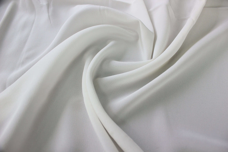 MingSilk 18 momme Crepe de Chine draped over a form to show its coverage, medium body and smooth fall.