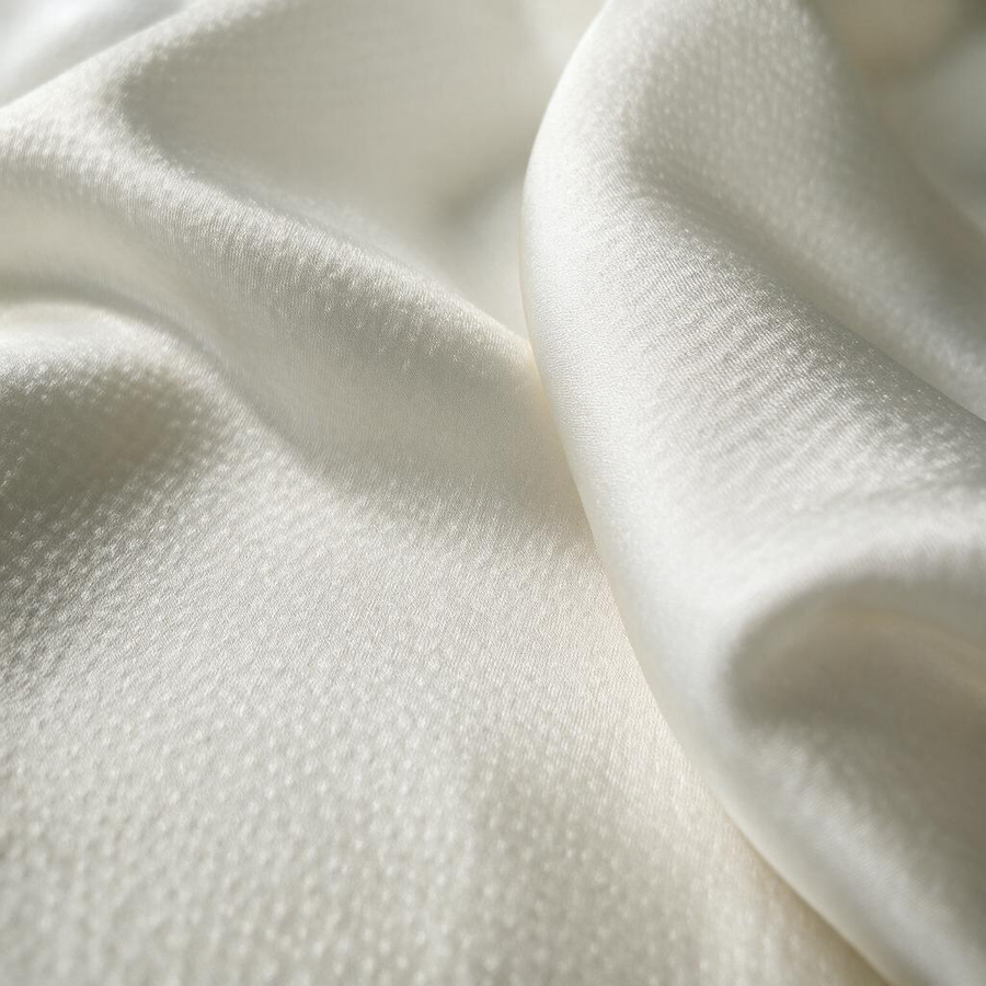 MingSilk 19 momme mulberry silk pearl satin with a fine textured surface, pearlescent lustre and fluid folds.