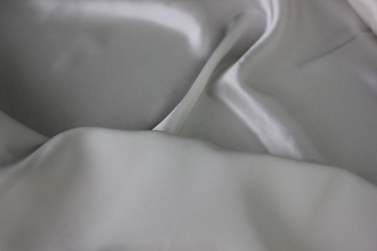 MingSilk 19 momme silk charmeuse with smooth folds, medium body and a soft fluid drape.