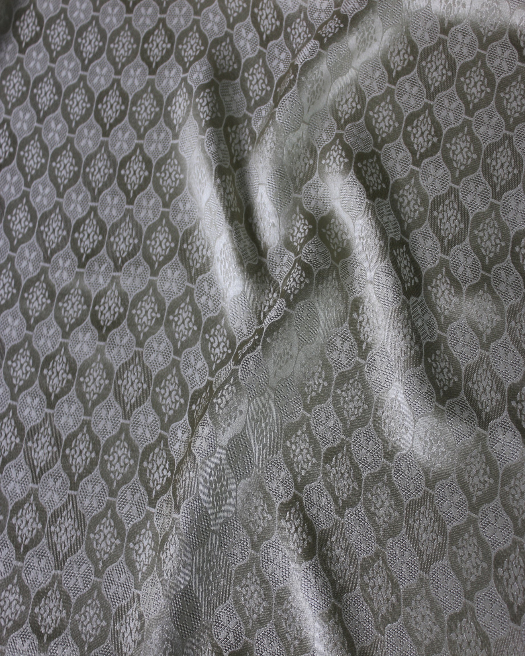 19 momme mulberry silk Sangbo jacquard satin RH-2395 showing woven geometric pattern and soft lustrous drape