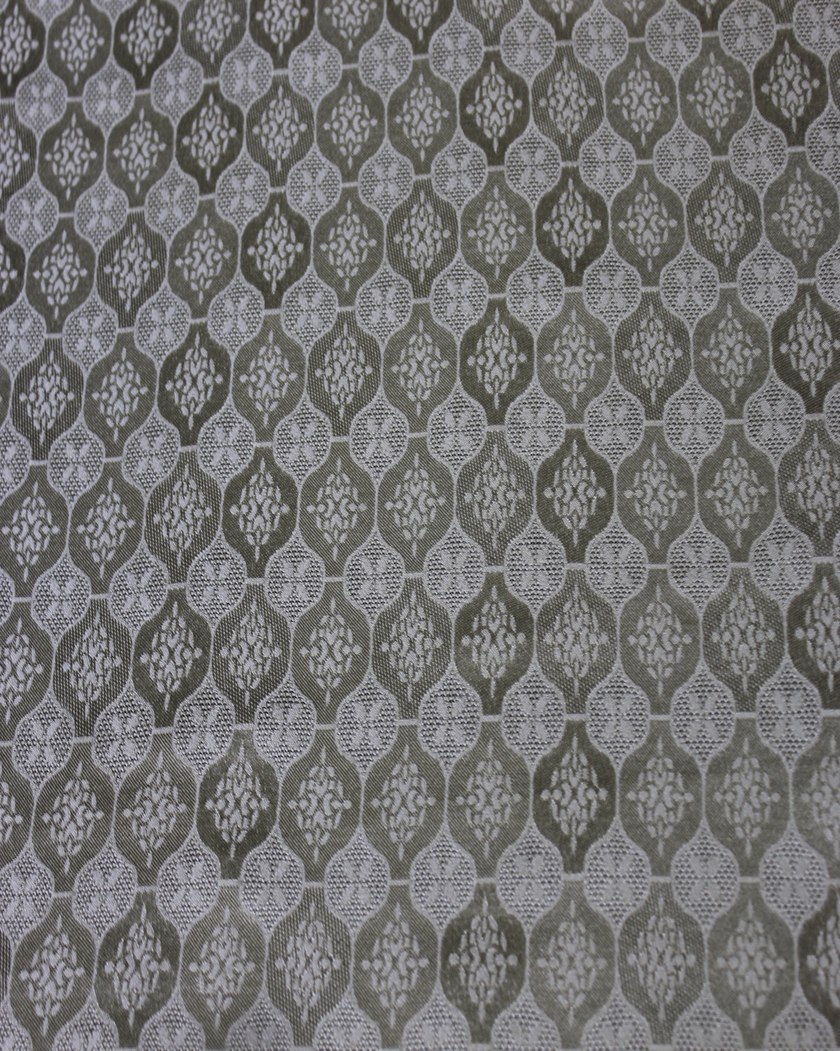 Close view of RH-2395 Sangbo silk jacquard satin showing detailed geometric medallion woven motifs