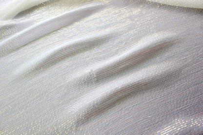 Detailed view of the fine longitudinal gold metallic stripe pattern on 5.5 momme silk Yoryu.