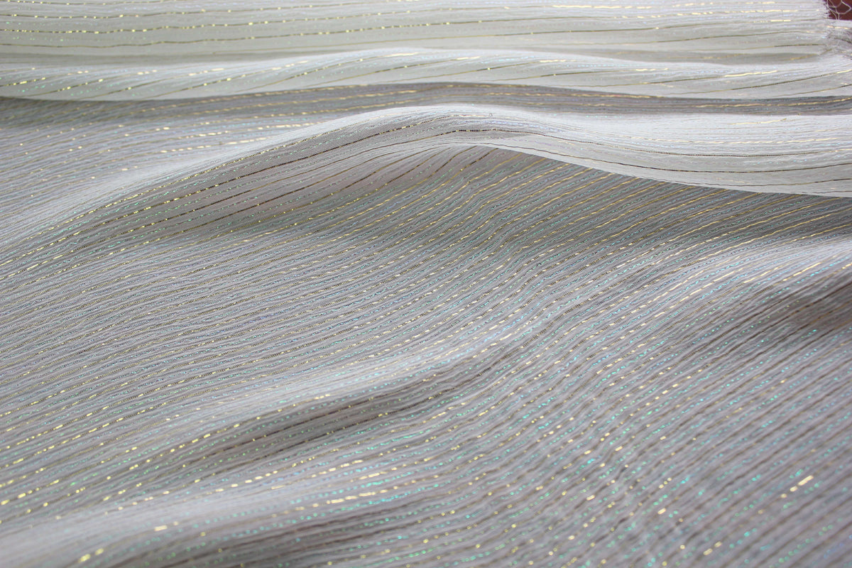 MingSilk 6 momme mulberry silk Yoryu in bleached white with fine iridescent metallic stripes and fluid folds.