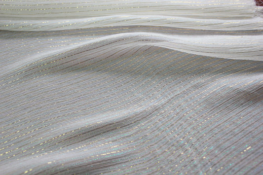 MingSilk 6 momme mulberry silk Yoryu in bleached white with fine iridescent metallic stripes and fluid folds.
