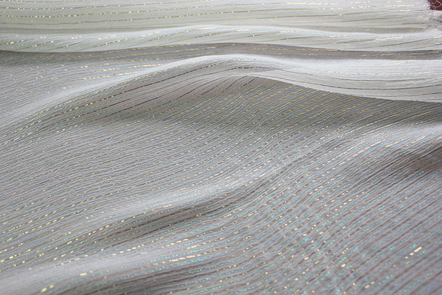 MingSilk 6 momme mulberry silk Yoryu in bleached white with fine iridescent metallic stripes and fluid folds.