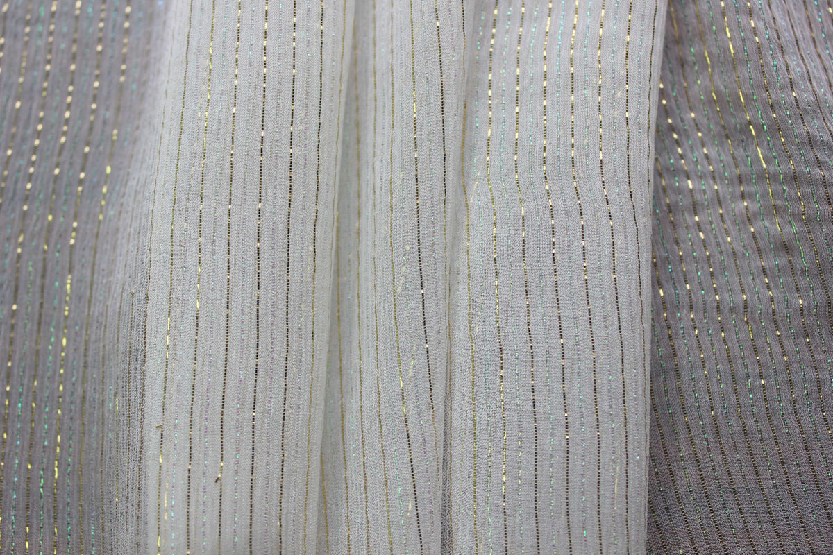 Sheer 6 momme MingSilk Yoryu silk shown against light and dark areas to demonstrate transparency.