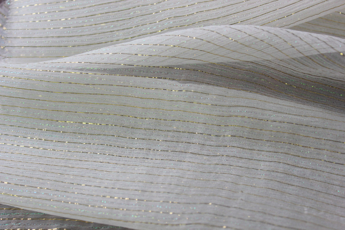 Layered 6 momme Yoryu sik showing semi-transparent construction, fine crinkles and metallic stripe details