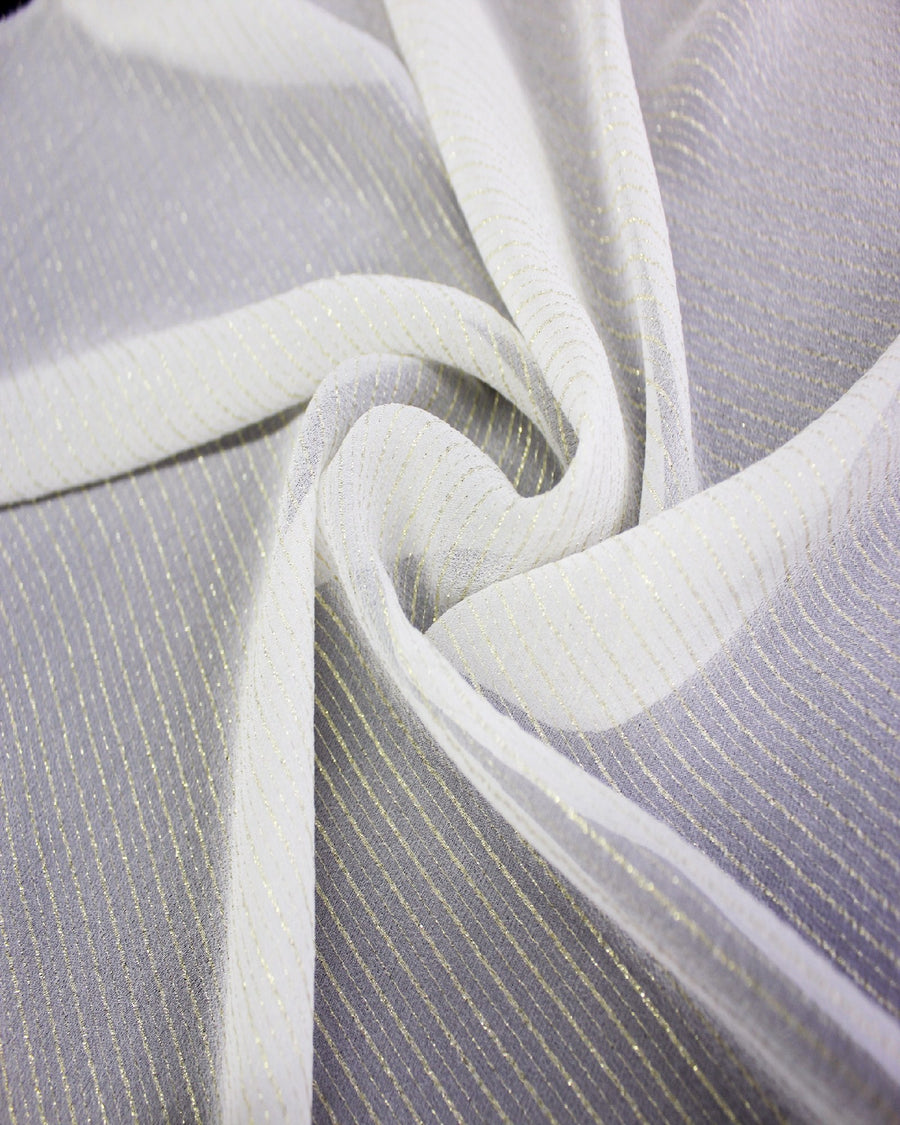 White 9 momme silk Yoryu fabric with fine gold metallic stripes, sheer texture and soft flowing drape.