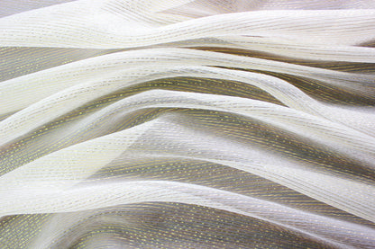 Lightweight MingSilk silk Yoryu arranged in flowing folds to show its airy and fluid drape.