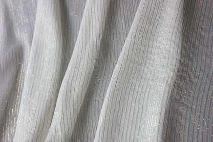 Lightweight MingSilk Yoryu silk draped vertically to show its airy movement and fluid fall.