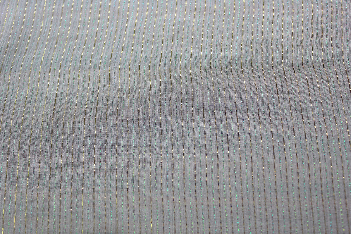 Macro view of fine crinkles and iridescent metallic pinstripes on MingSilk mulberry silk Yoryu fabric.