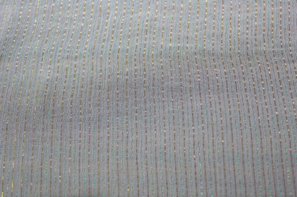 Macro view of fine crinkles and iridescent metallic pinstripes on MingSilk mulberry silk Yoryu fabric.